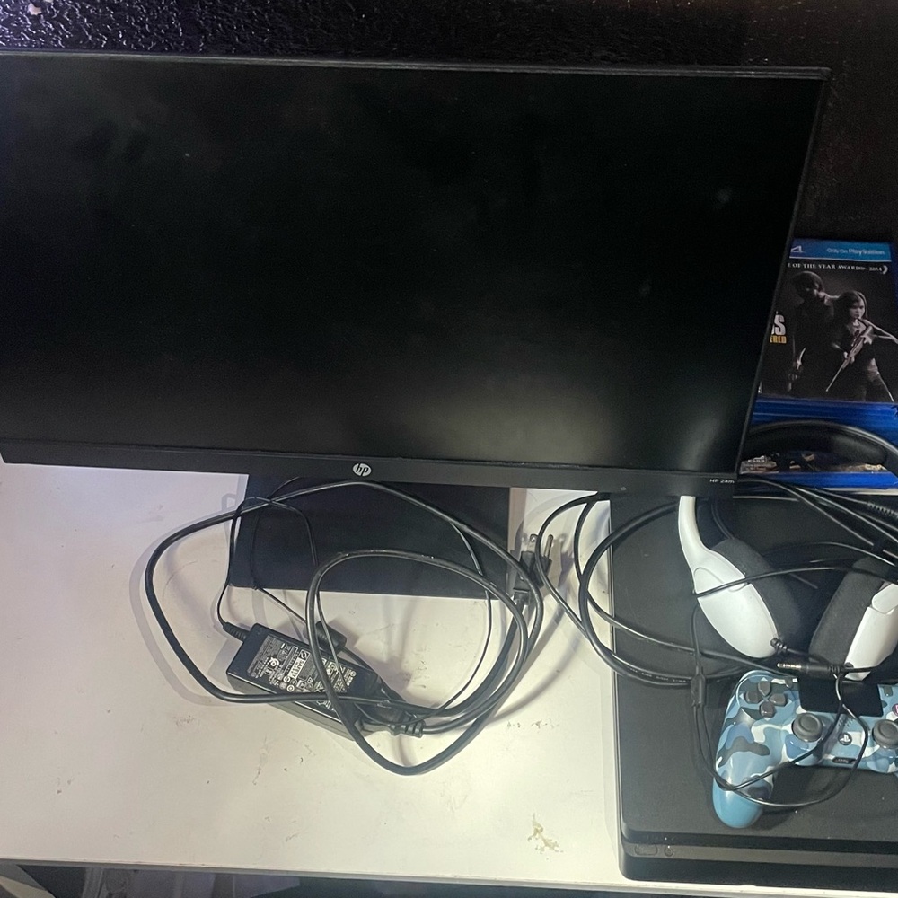 PS4 and Monitor with games